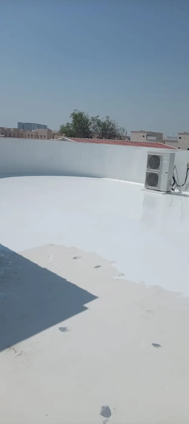 Completed roof: Finished coating turned up the parapet.
